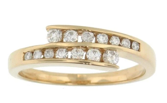 Halo - Style Women's Diamond Rings with a Center Diamond Surrounded by Smaller Diamonds in 18K GoldYellow Gold Diamond Ring.