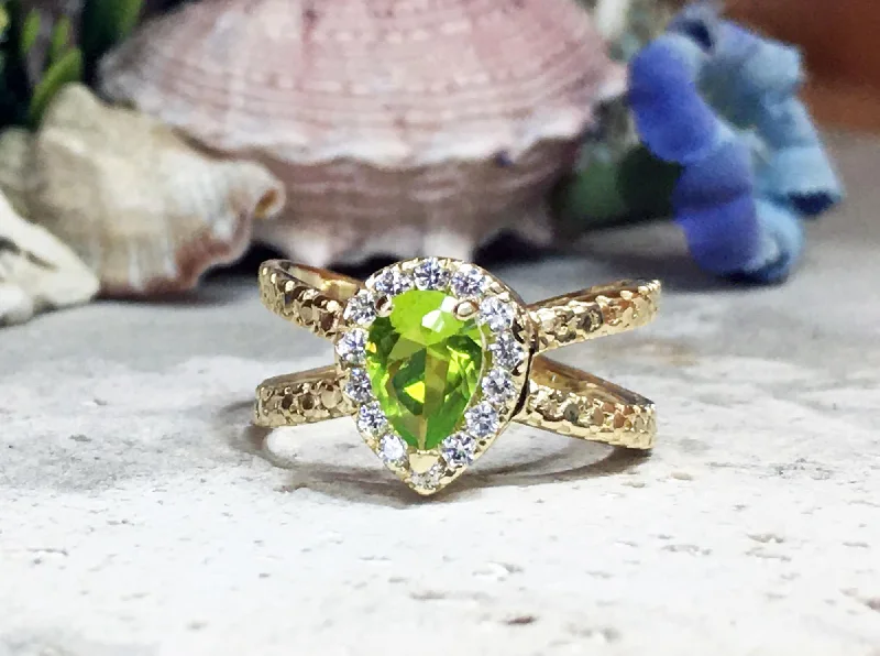 Malachite Gemstone Rings in 14K Gold with a Carved Stone for a Unique and Artistic AppealPeridot Ring - August Birthstone Jewelry - Statement Engagement Ring with Pear-Shaped Peridot Gemstone and Clear Quartz Halo