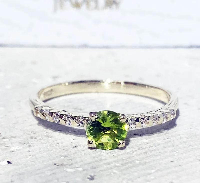 Iolite Gemstone Rings in 10K Gold with a Twisted Band for a Distinctive and Stylish AccessoryPeridot Ring - August Birthstone - Round Peridot Gemstone Ring with Clear Quartz Accents