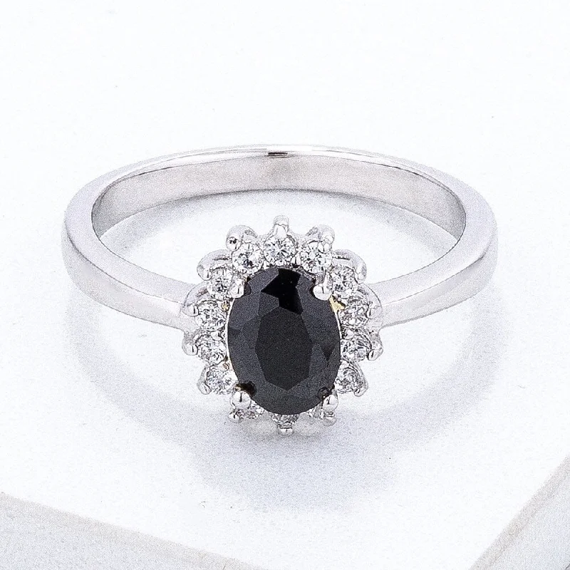 Magnetic Fashion Rings in Stainless Steel with a Modern, Interlocking DesignBlack and Clear Cubic Zirconia Petite Oval Cut Ring