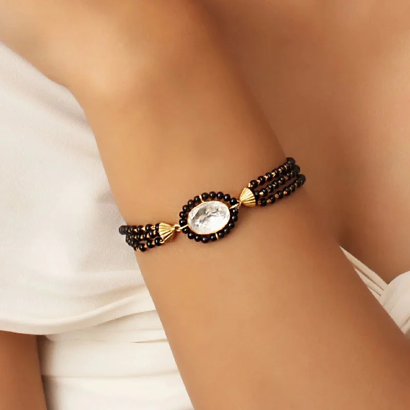 Boho - Style Bangle Bracelets with Feather and Bead EmbellishmentsBlack beads mangalsutra bracelet