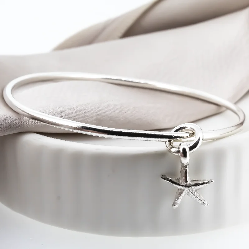 Solid Gold Bangles with Intricate Floral Engravings for a Luxurious LookTrue starfish Charm Bangle