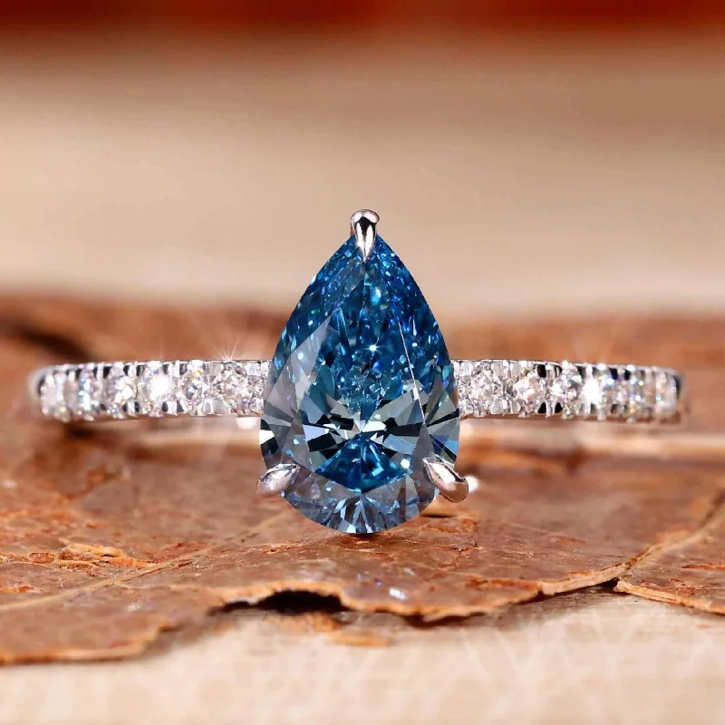 Pear - Shaped Engagement Rings in Yellow Gold with a Diamond - Encrusted Band1.02 CT Fancy Blue Pear Cut Lab Grown Diamond Pave Engagement Ring