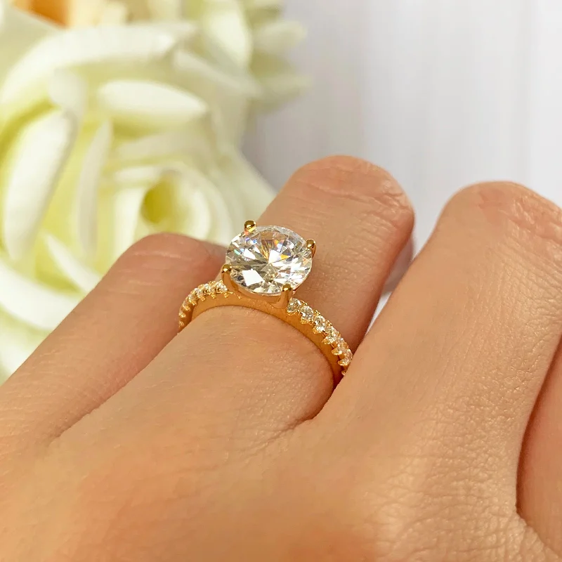 Art Deco Engagement Rings with Geometric Patterns and Baguette - Cut Diamond Accents2.25 ctw Round Accented Solitaire Ring - Yellow GP