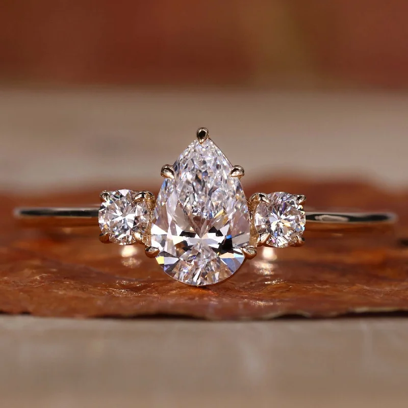 Adjustable Engagement Rings with a Flexible Band and a Princess - Cut Center DiamondPear and Round Three Stone Lab Grown Diamond Engagement Ring