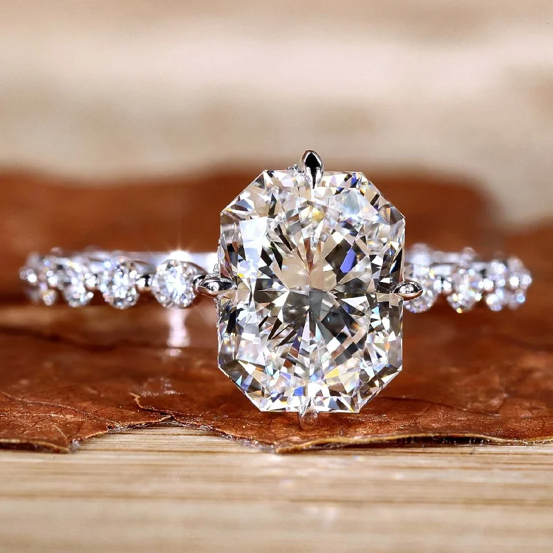 Cathedral - Style Engagement Rings with a Raised Center Stone and Intricate MetalworkRadiant Cut Lab Grown Diamond Pave Engagement Ring