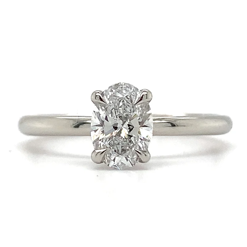 Cathedral - Style Engagement Rings with a Raised Center Stone and Intricate MetalworkValeria - Platinum 0.78ct Laboratory Grown Oval Solitaire Engagement Ring with Hidden Halo