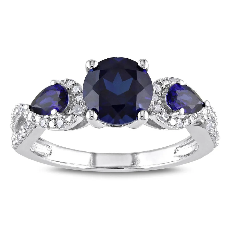 Sapphire Gemstone Rings in 18K White Gold with Diamond Accents for an Elegant EngagementMiadora Sterling Silver Created Sapphire and 1/6ct TDW Diamond 3-Stone Crossover Ring